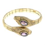 An early 20th century amethyst crossover snake bangle.