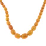 A graduated amber bead single-strand necklace.