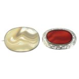 Two agate brooches.