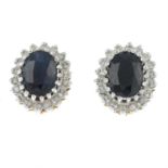 A pair of 18ct gold sapphire and diamond cluster earrings.