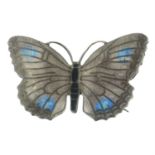 An enamel butterfly brooch.
