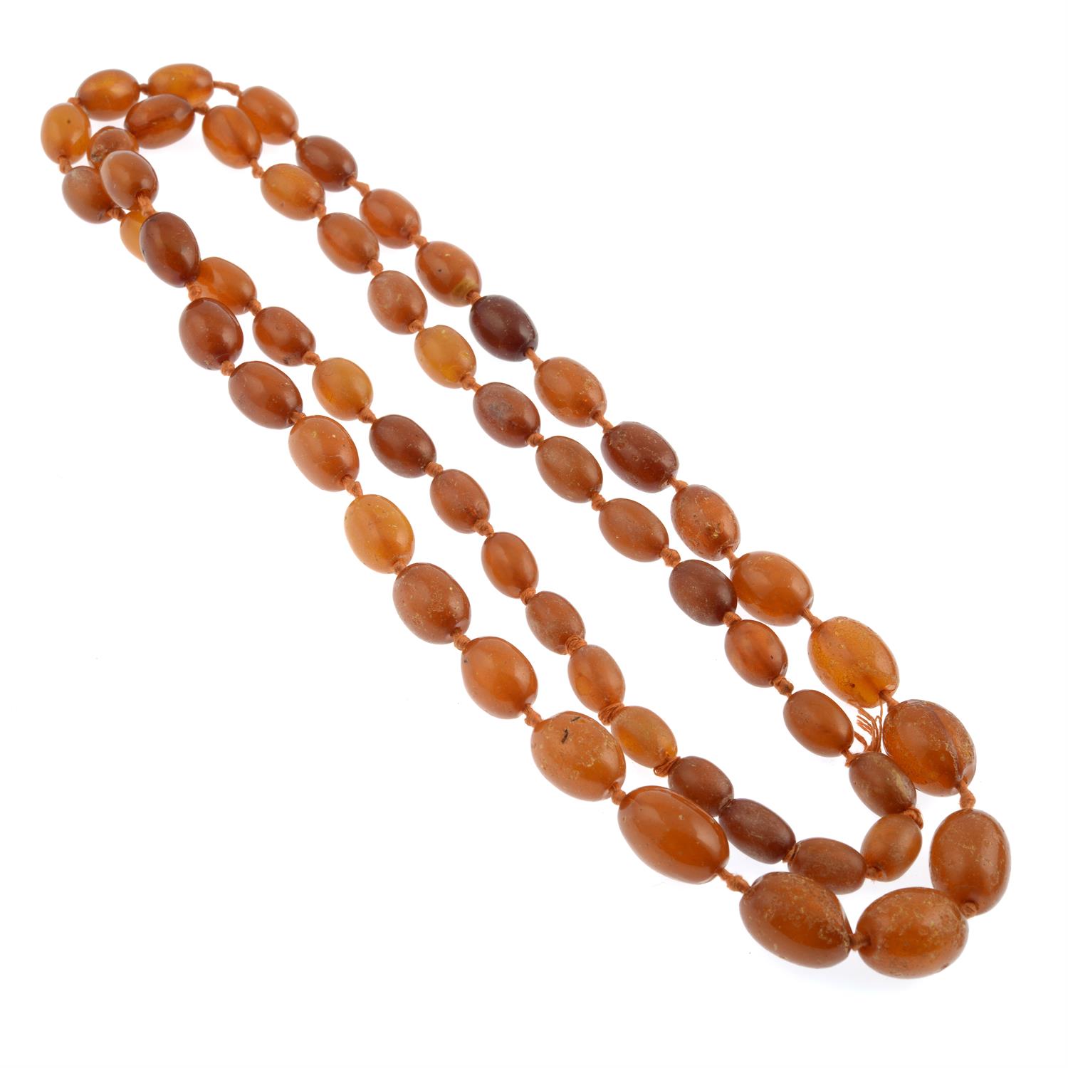 An amber oval bead single-strand woven necklace.