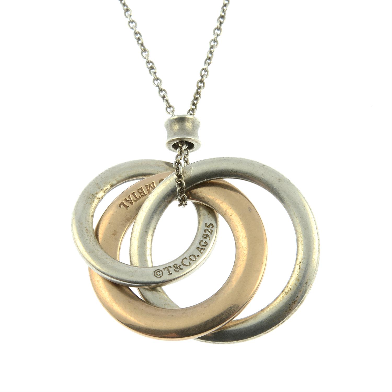 An interlocking three circle 'Tiffany 1837' pendant, with integral chain, by Tiffany & Co.