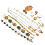 A selection of thirteen items of amber jewellery, together with a pair of marcasite and cubic