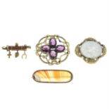 Four early 20th century gem-set brooches.