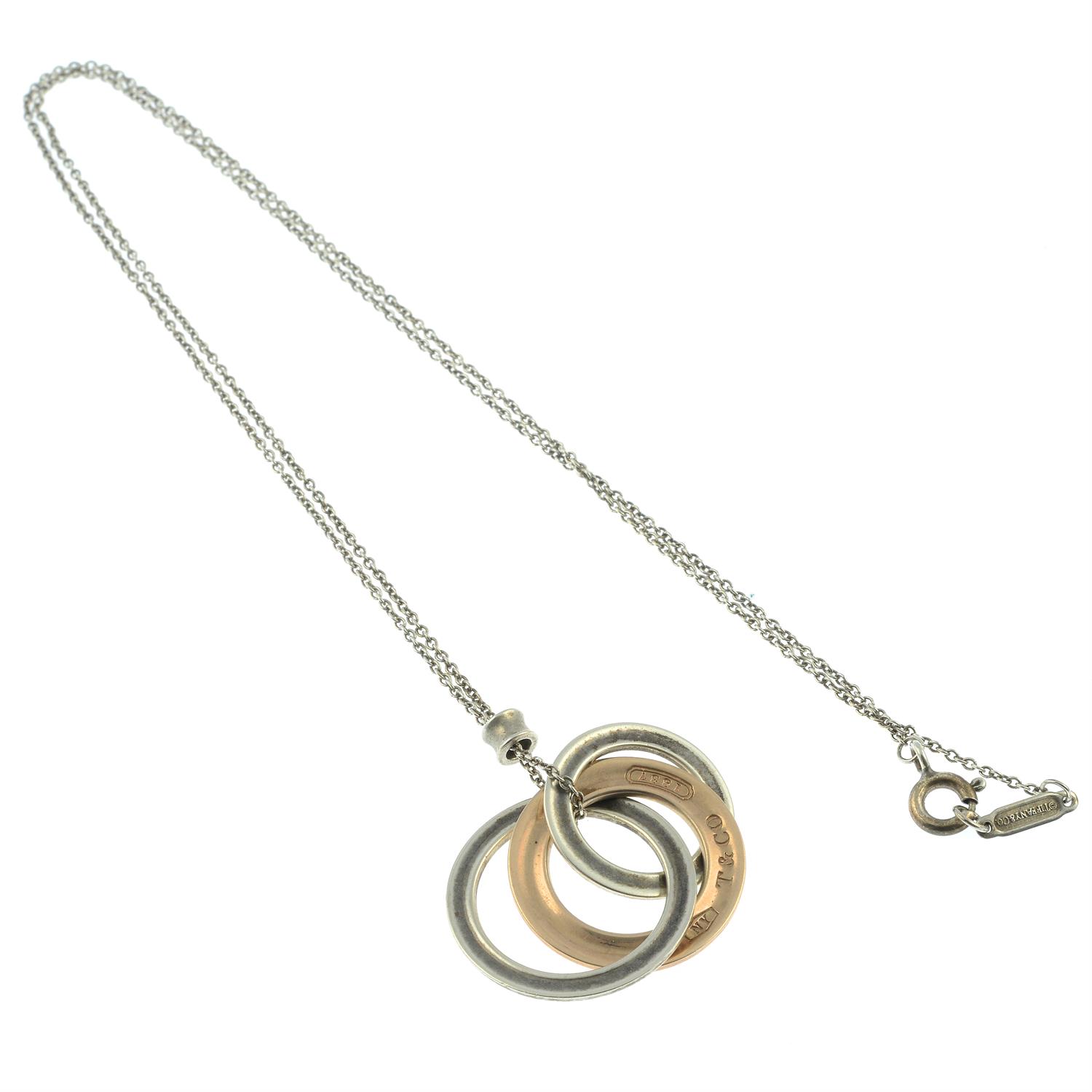 An interlocking three circle 'Tiffany 1837' pendant, with integral chain, by Tiffany & Co. - Image 2 of 2