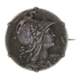 An Art Nouveau silver medal brooch, depicting Achilles.