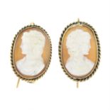 A pair of shell cameo earrings.