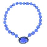 A blue paste bead floral necklace.