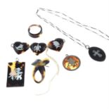 A selection of tortoiseshell jewellery, to include pendants, a necklace, a ring, a brooch and a