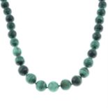 A malachite single-strand bead necklace.