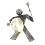 A silver brooch, by Charles Horner, depicting a drummer boy.