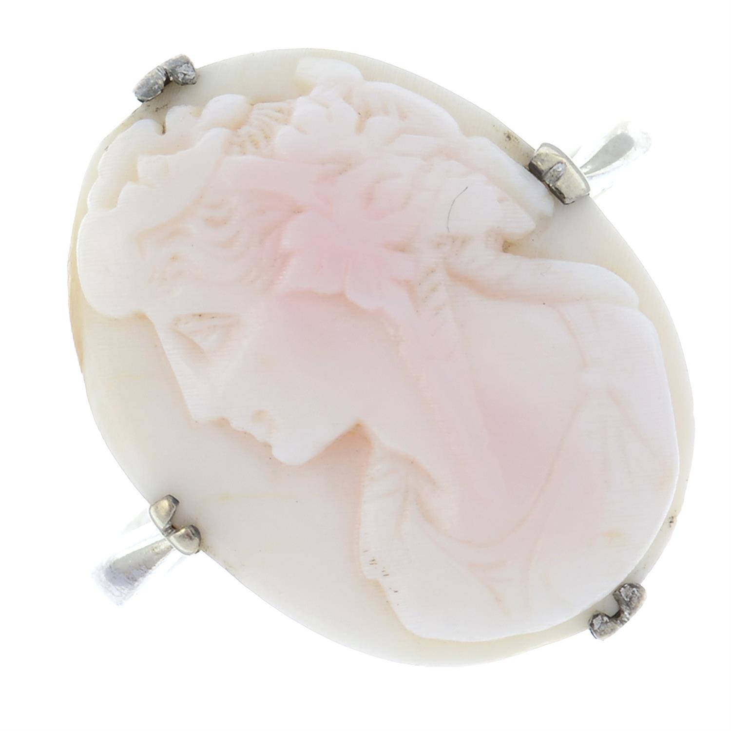 A cameo single-stone ring.