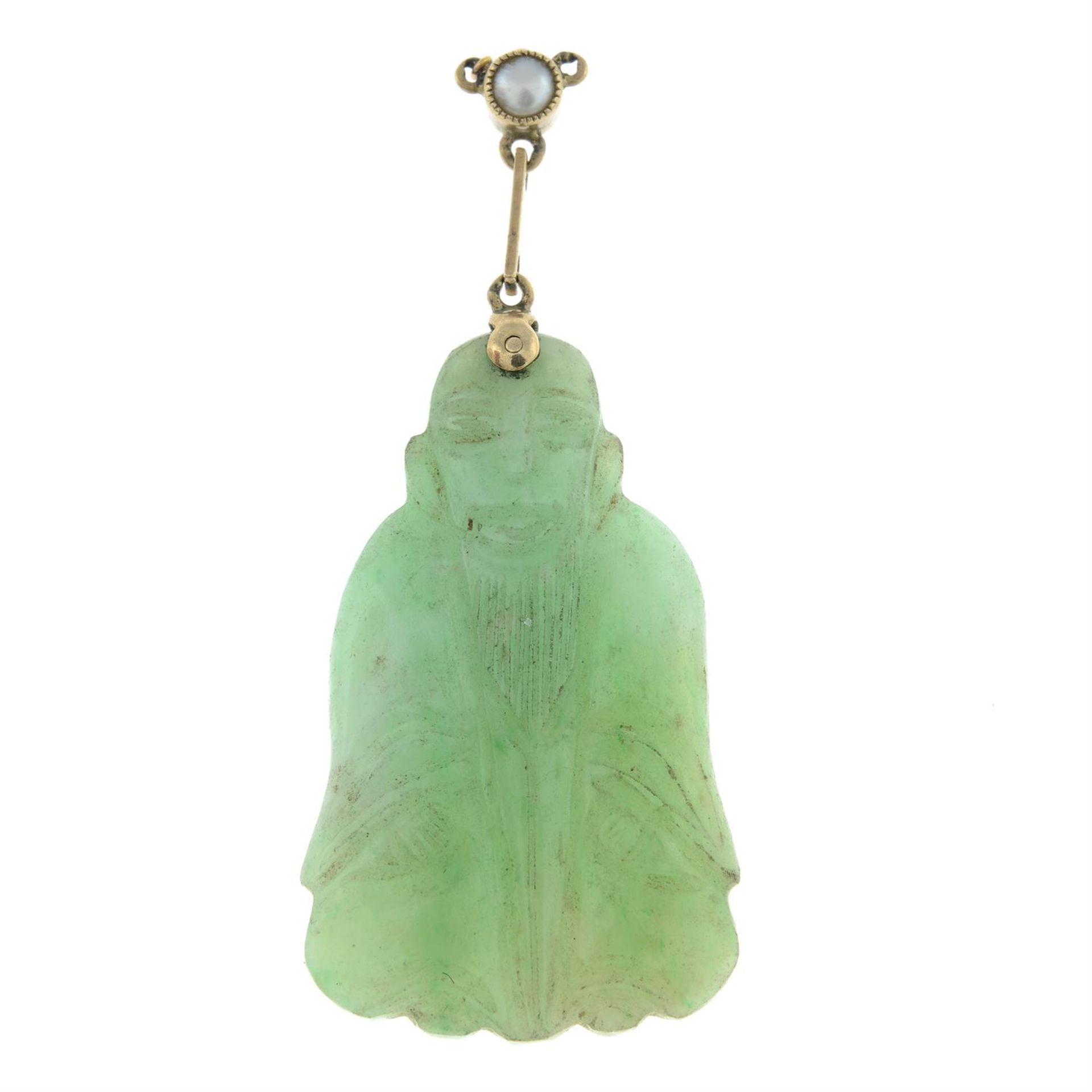 A mid 20th century carved jade pendant, with split pearl surmount.