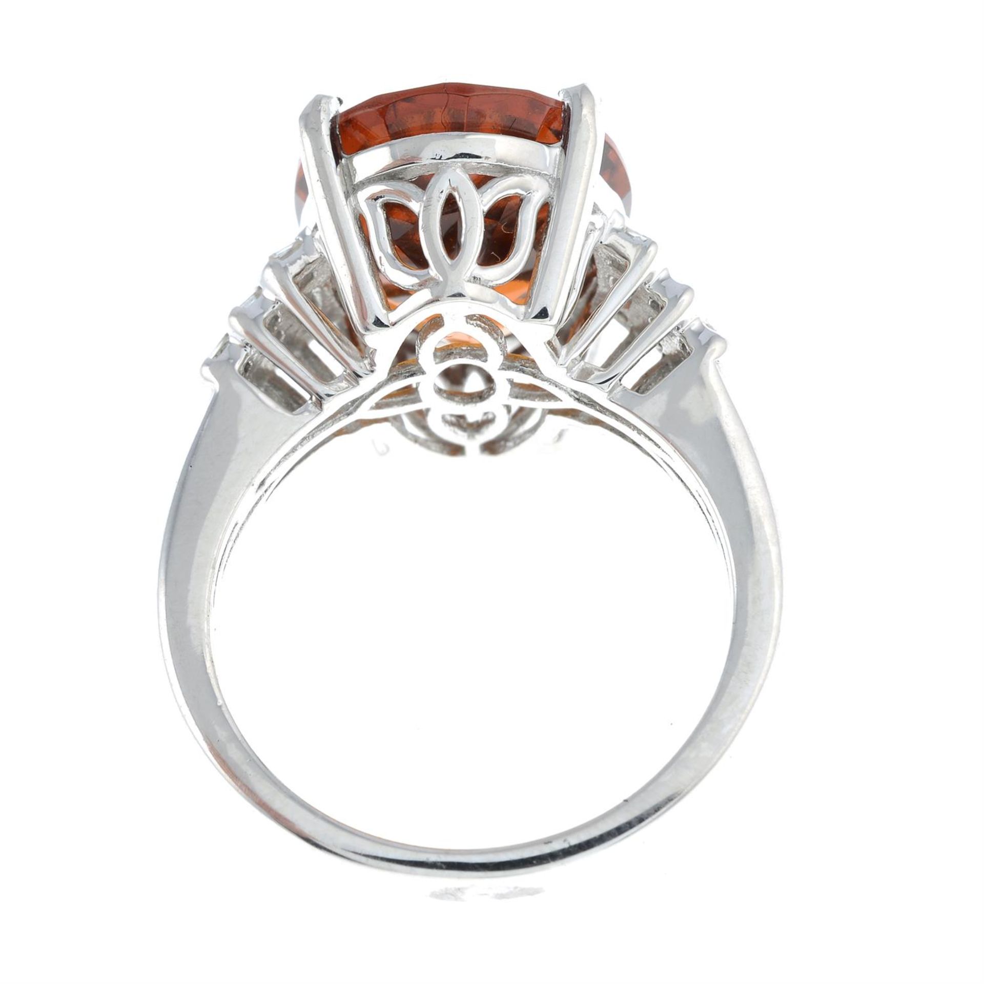 A hessonite garnet and diamond dress ring. - Image 2 of 2