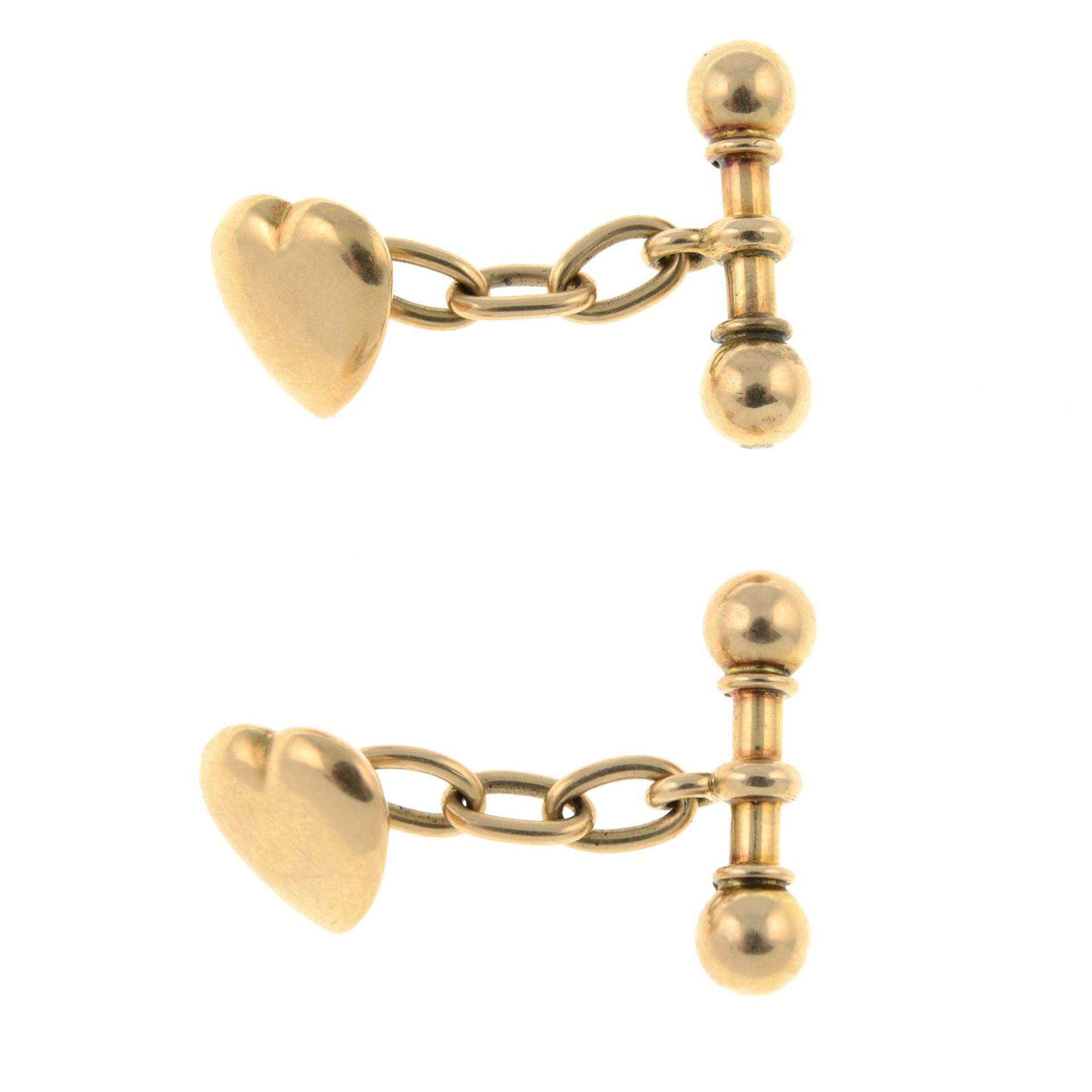 A pair of early 20th century 15ct gold heart-shape cufflinks.