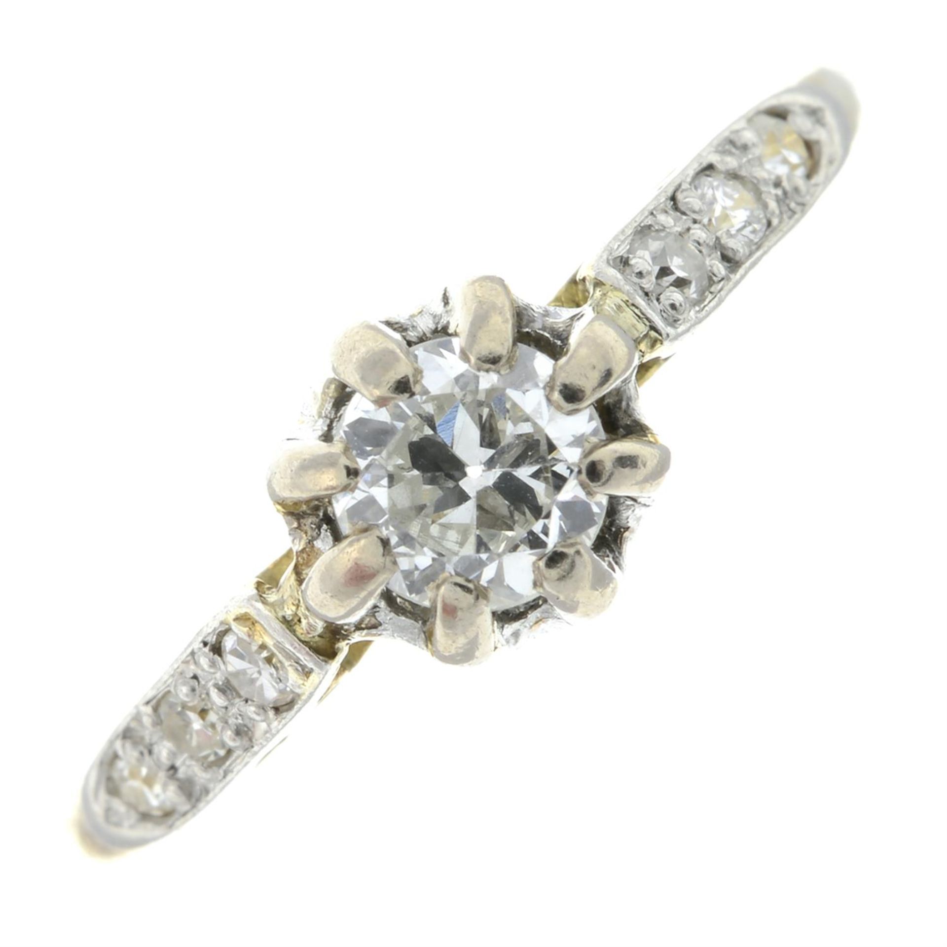 A brilliant-cut diamond single-stone ring, with old-cut diamond shoulders.