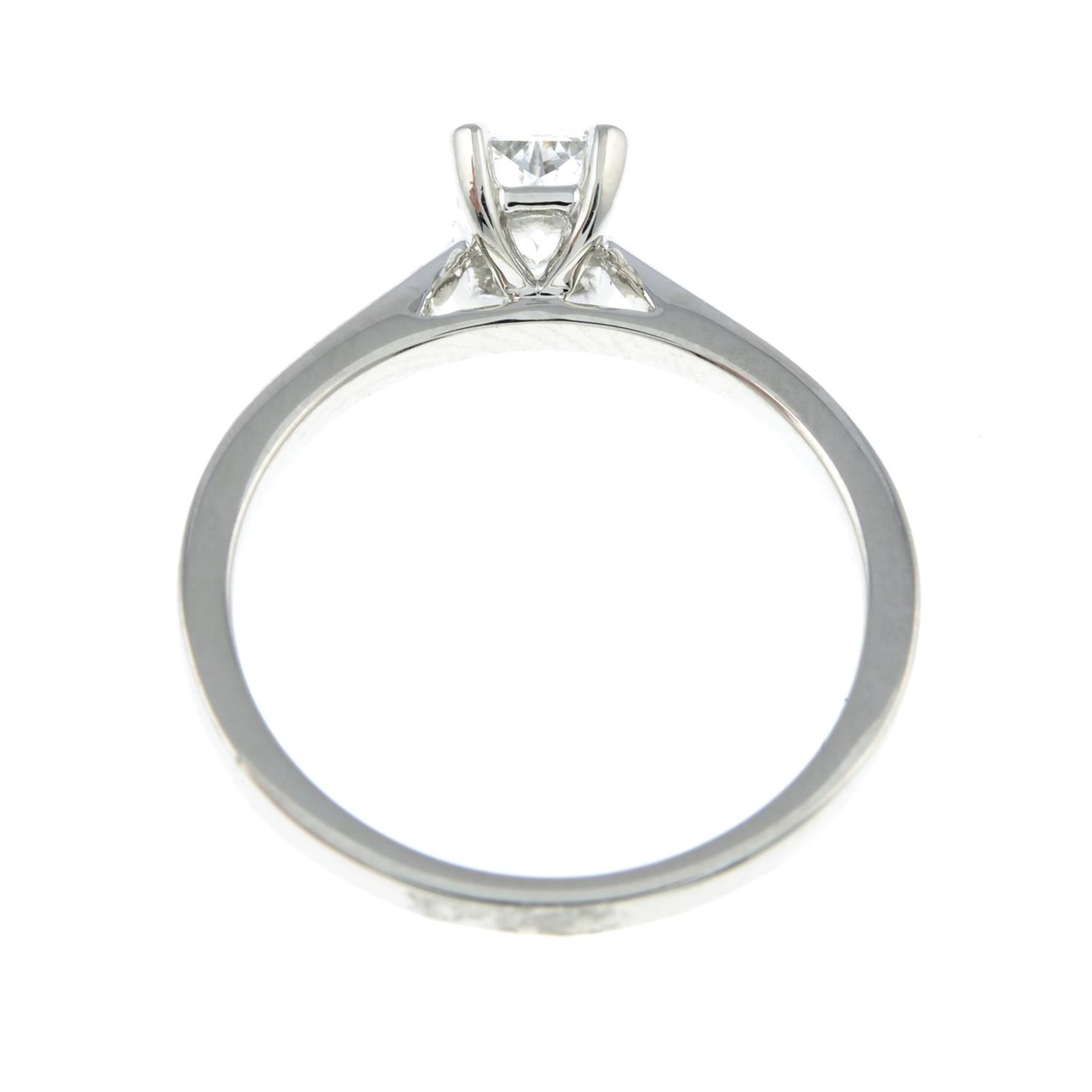 A platinum rectangular-shape diamond single-stone ring. - Image 2 of 2