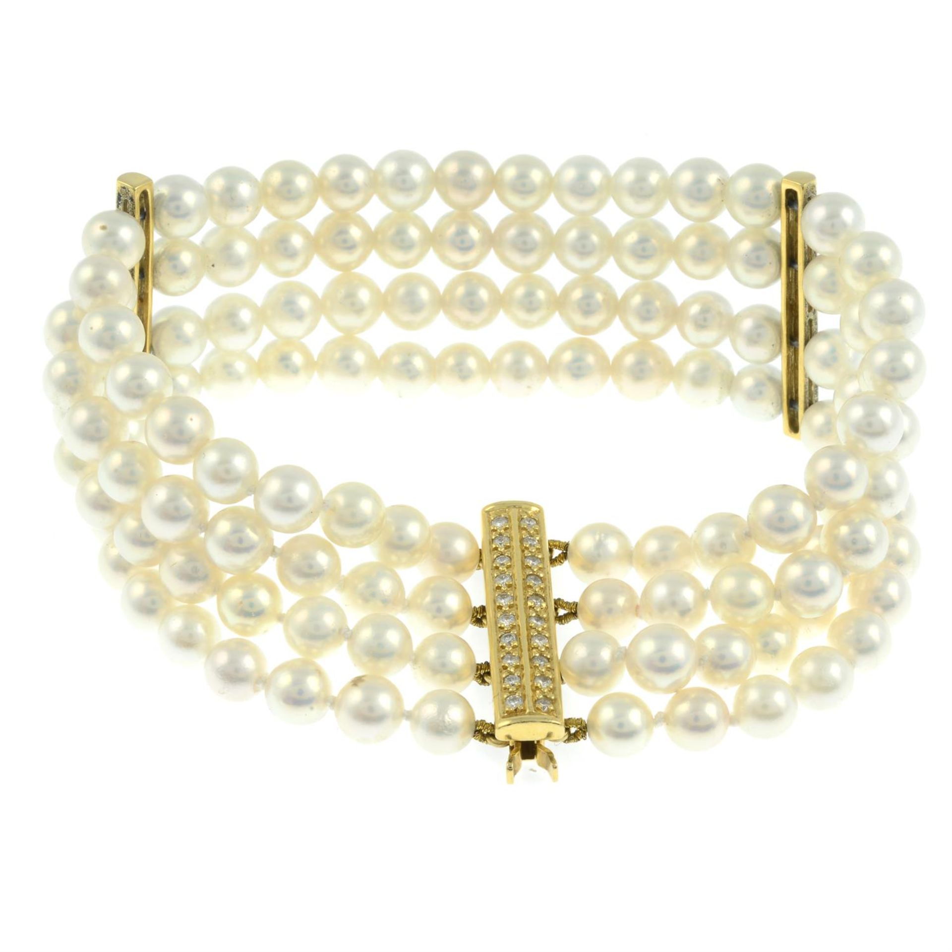 An 18ct gold four-row cultured pearl bracelet, with diamond spacers. - Image 2 of 2