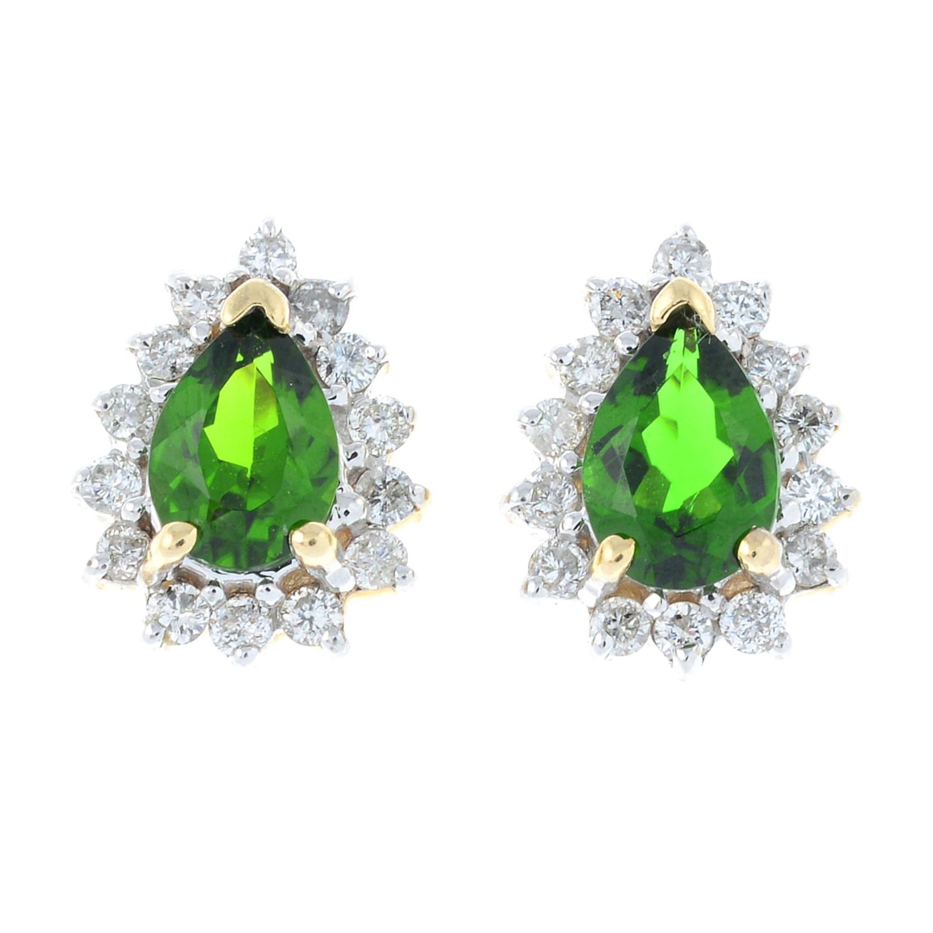 A pair of tourmaline and diamond cluster stud earrings.