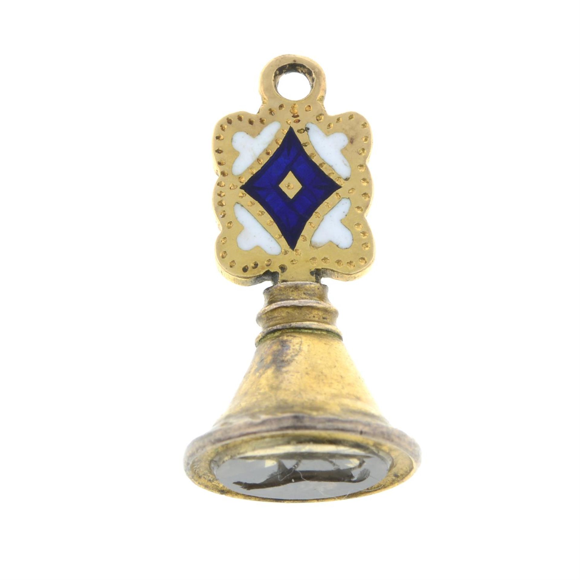 A late 19th century enamel fob seal, with citrine intaglio, depicting a horse.