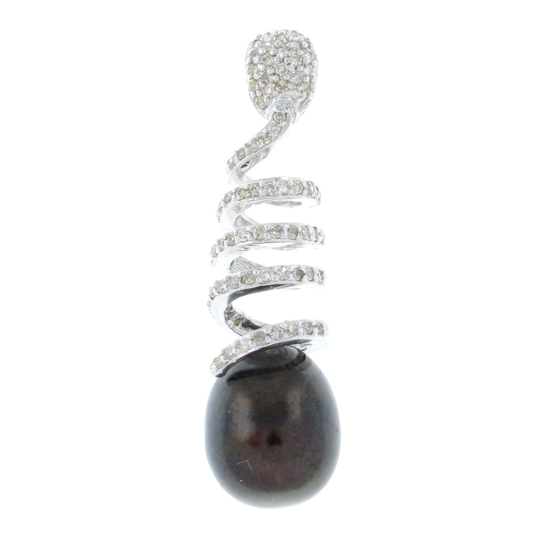 A cultured pearl and diamond spiral pendant.