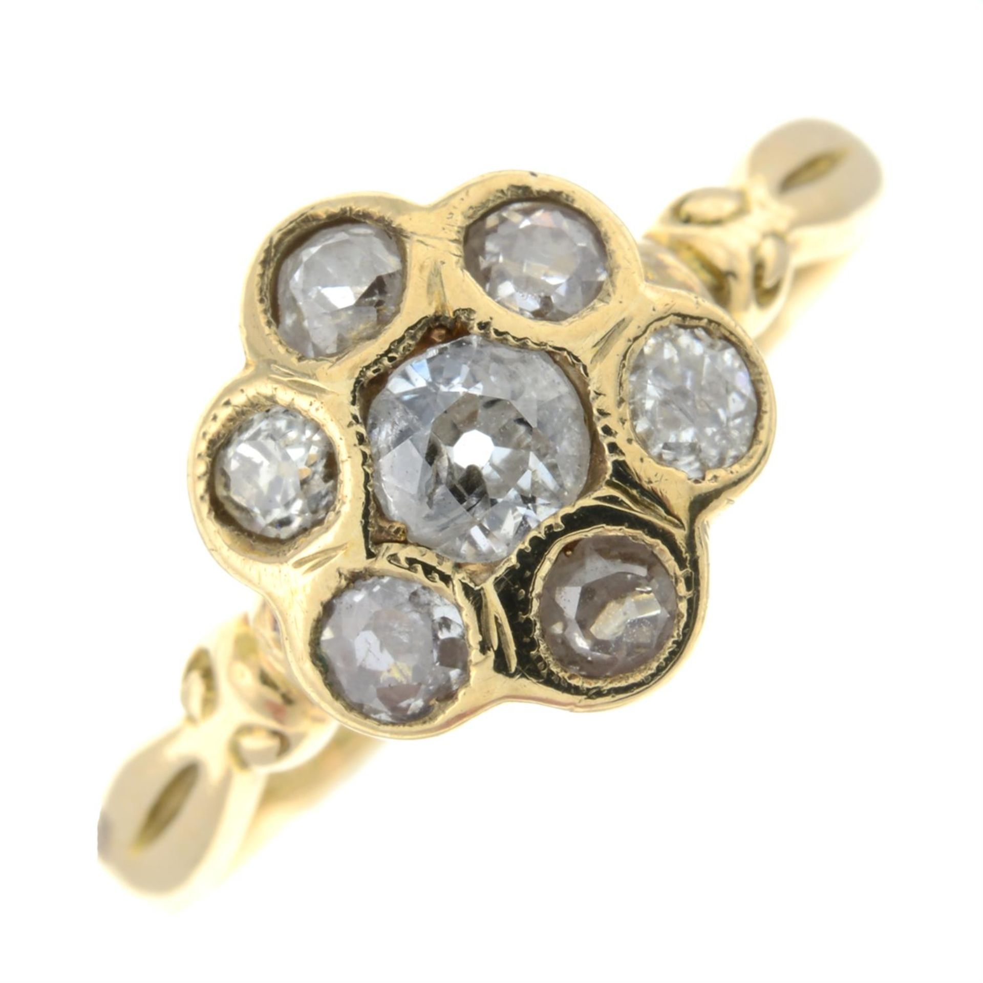 An 18ct gold old-cut diamond floral cluster ring.