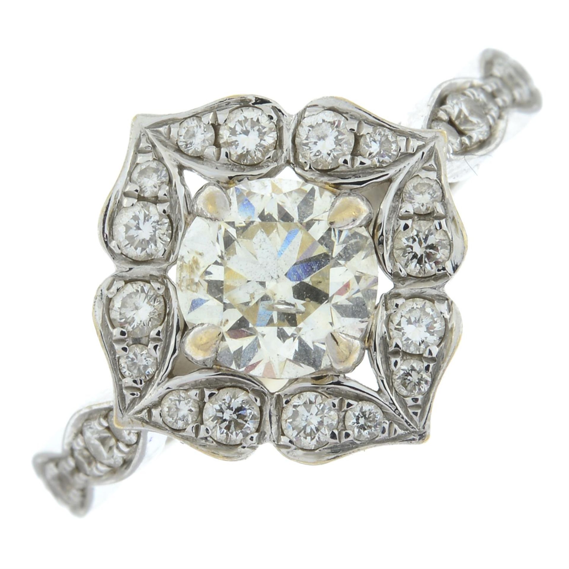 A brilliant-cut diamond cluster ring.