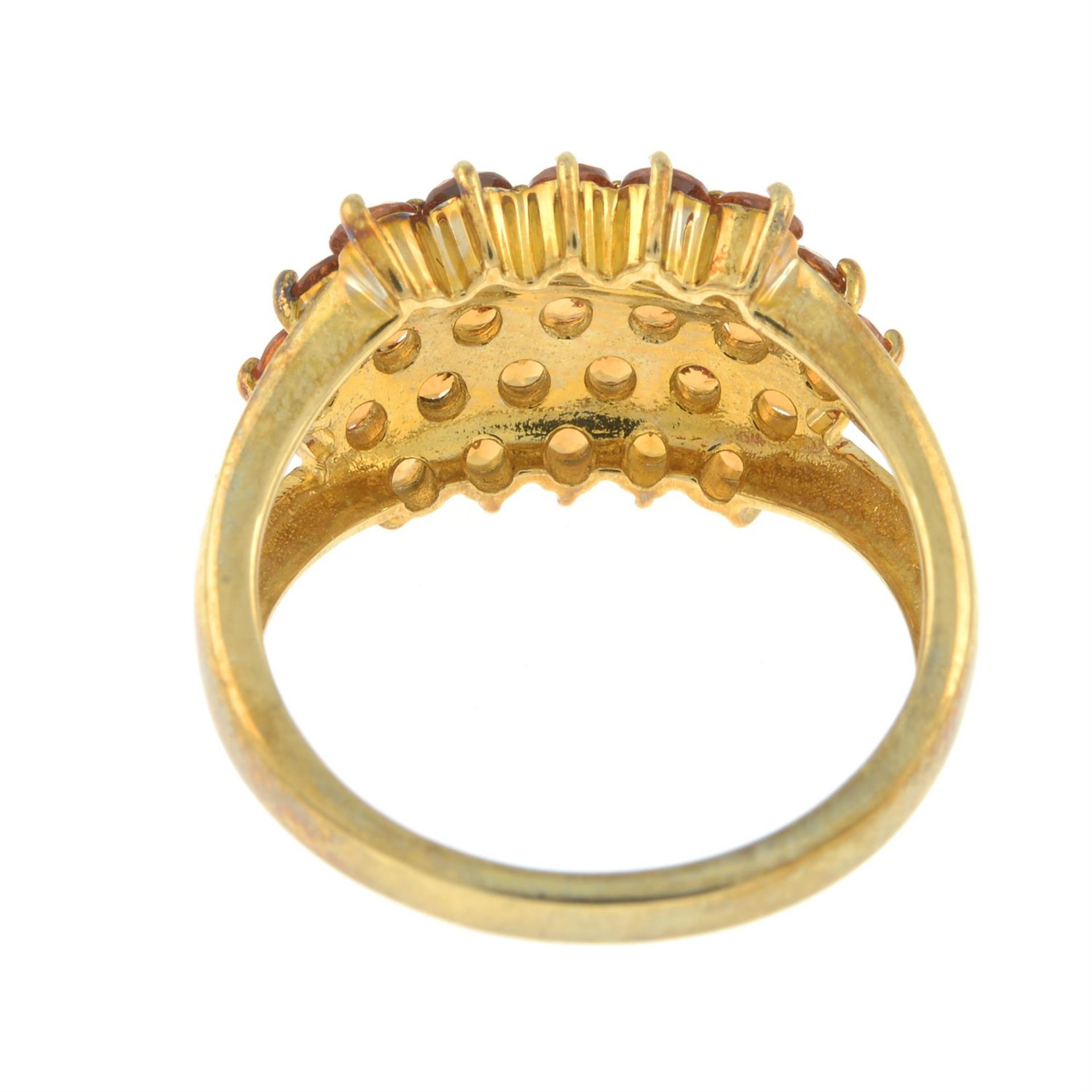 A 9ct gold orange garnet cluster ring. - Image 2 of 2