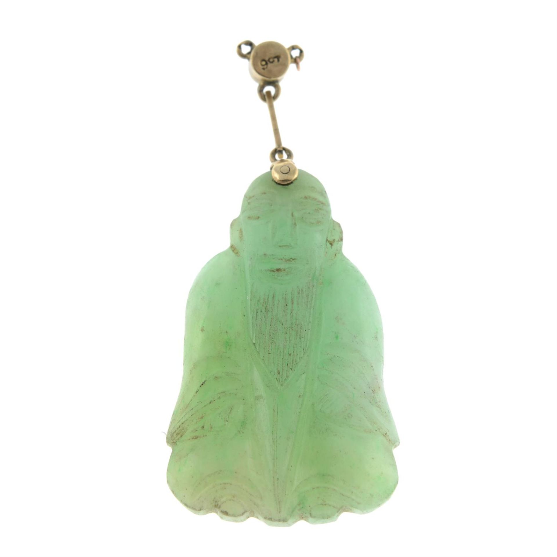 A mid 20th century carved jade pendant, with split pearl surmount. - Image 2 of 2