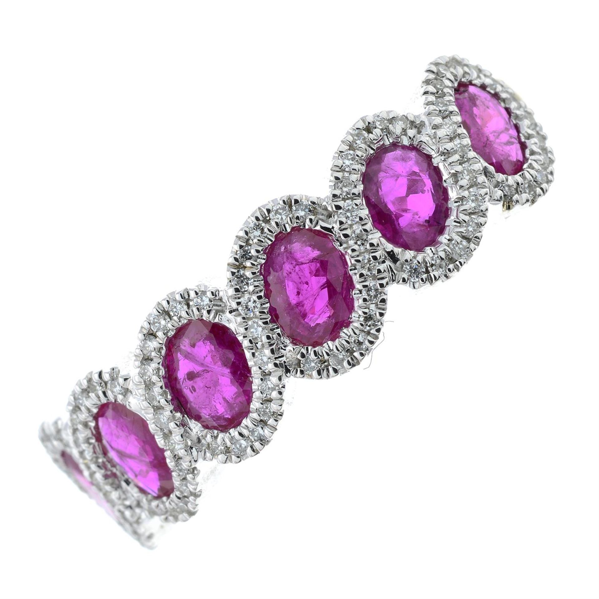 An 18ct gold ruby and pavé-set diamond dress ring.