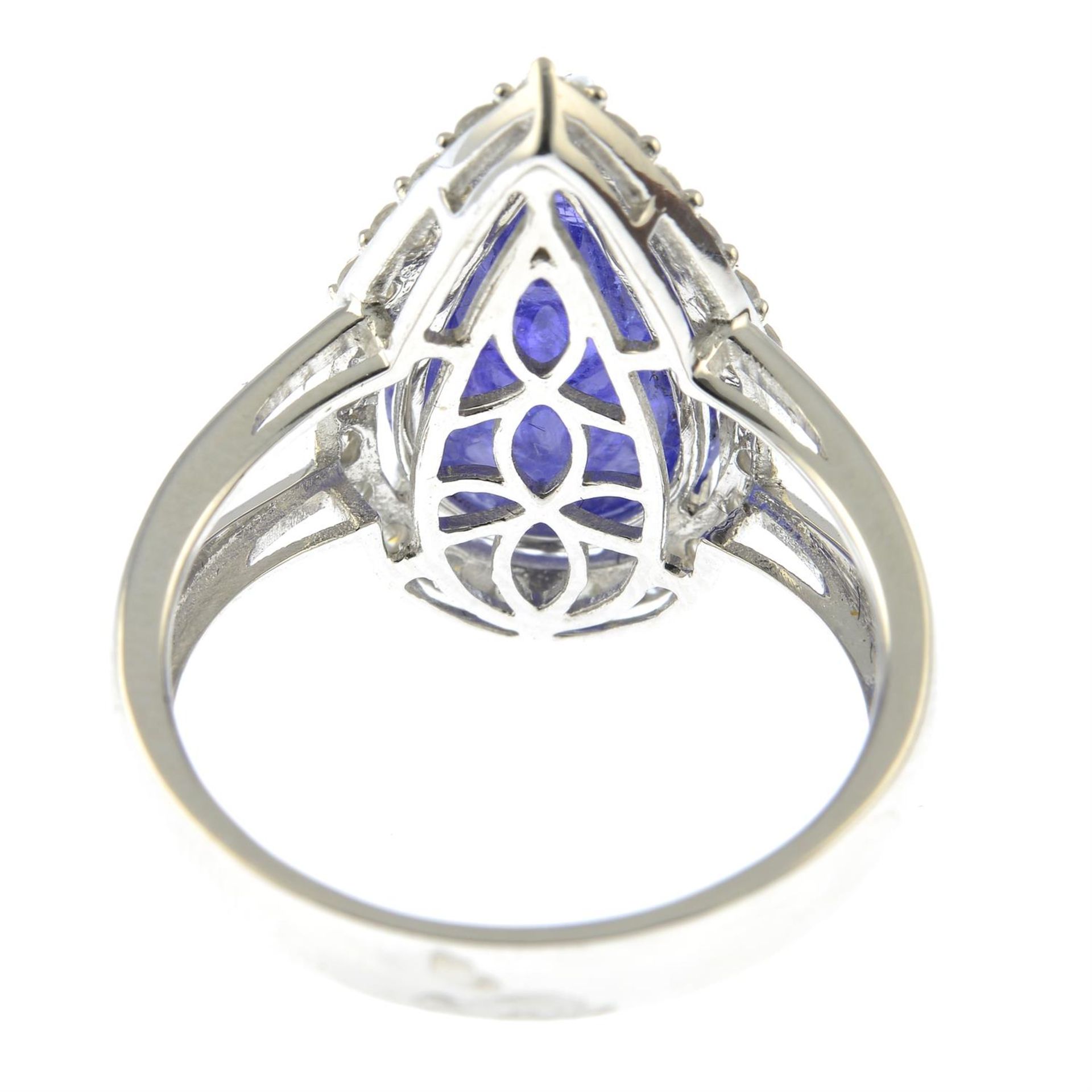 A tanzanite cabochon and diamond cluster ring. - Image 4 of 5