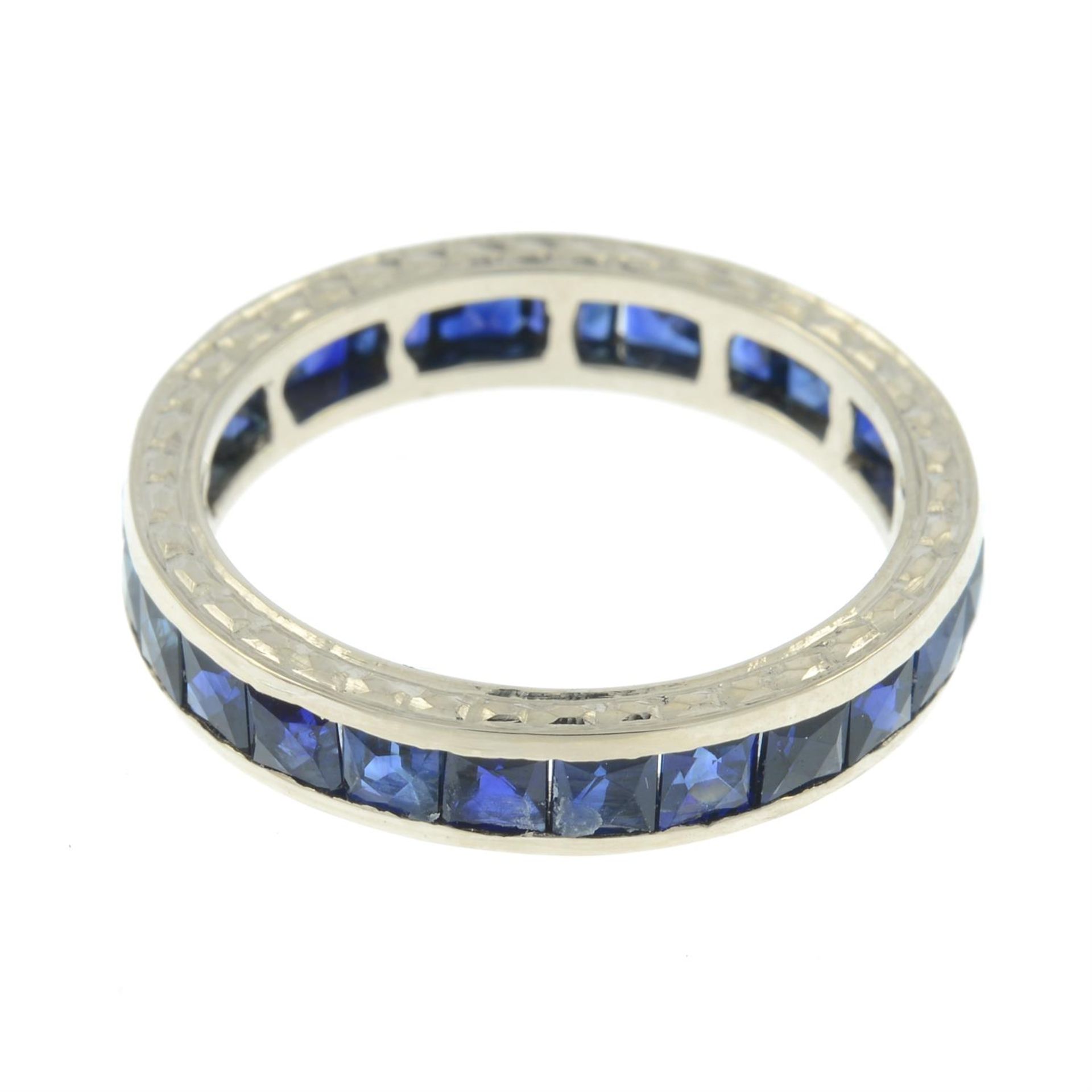 A sapphire full eternity ring, with engraved sides. - Image 2 of 2