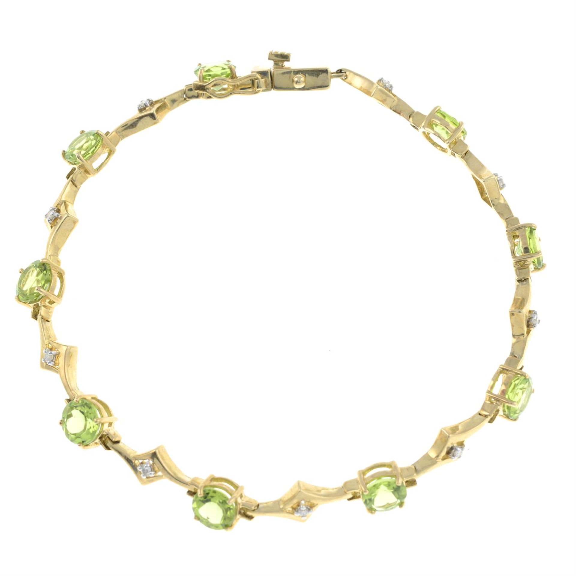 A 9ct gold peridot and diamond bracelet.