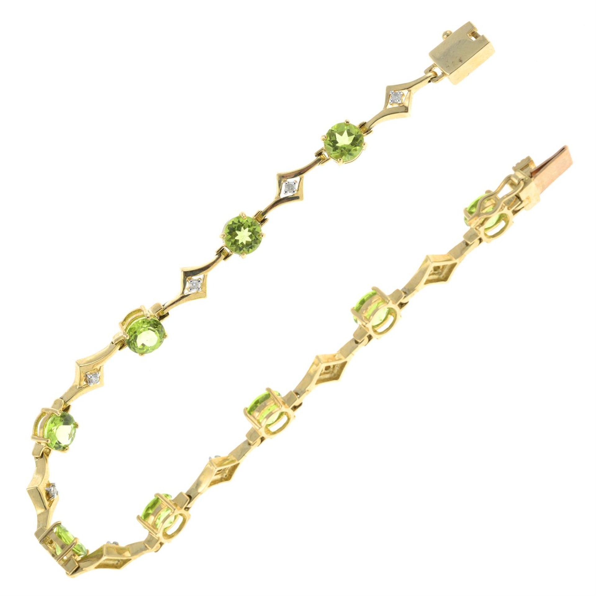 A 9ct gold peridot and diamond bracelet. - Image 2 of 2