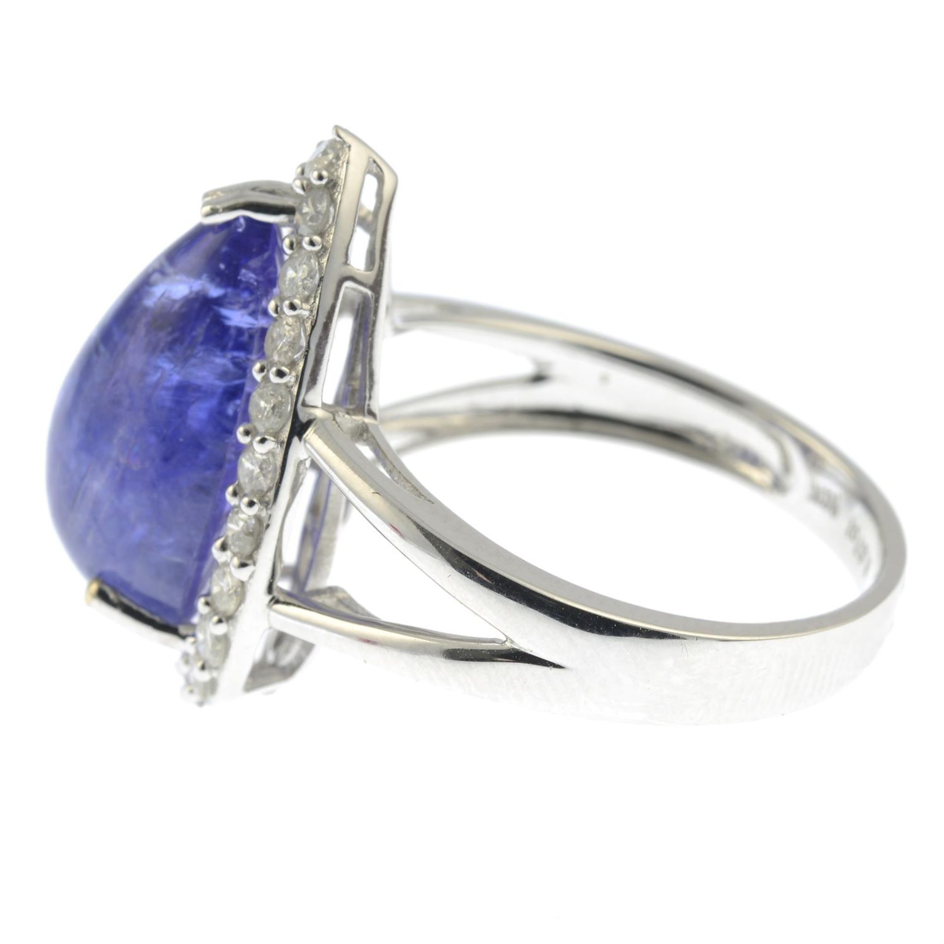 A tanzanite cabochon and diamond cluster ring. - Image 3 of 5