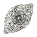 A brilliant-cut diamond openwork ring, with diamond accents.