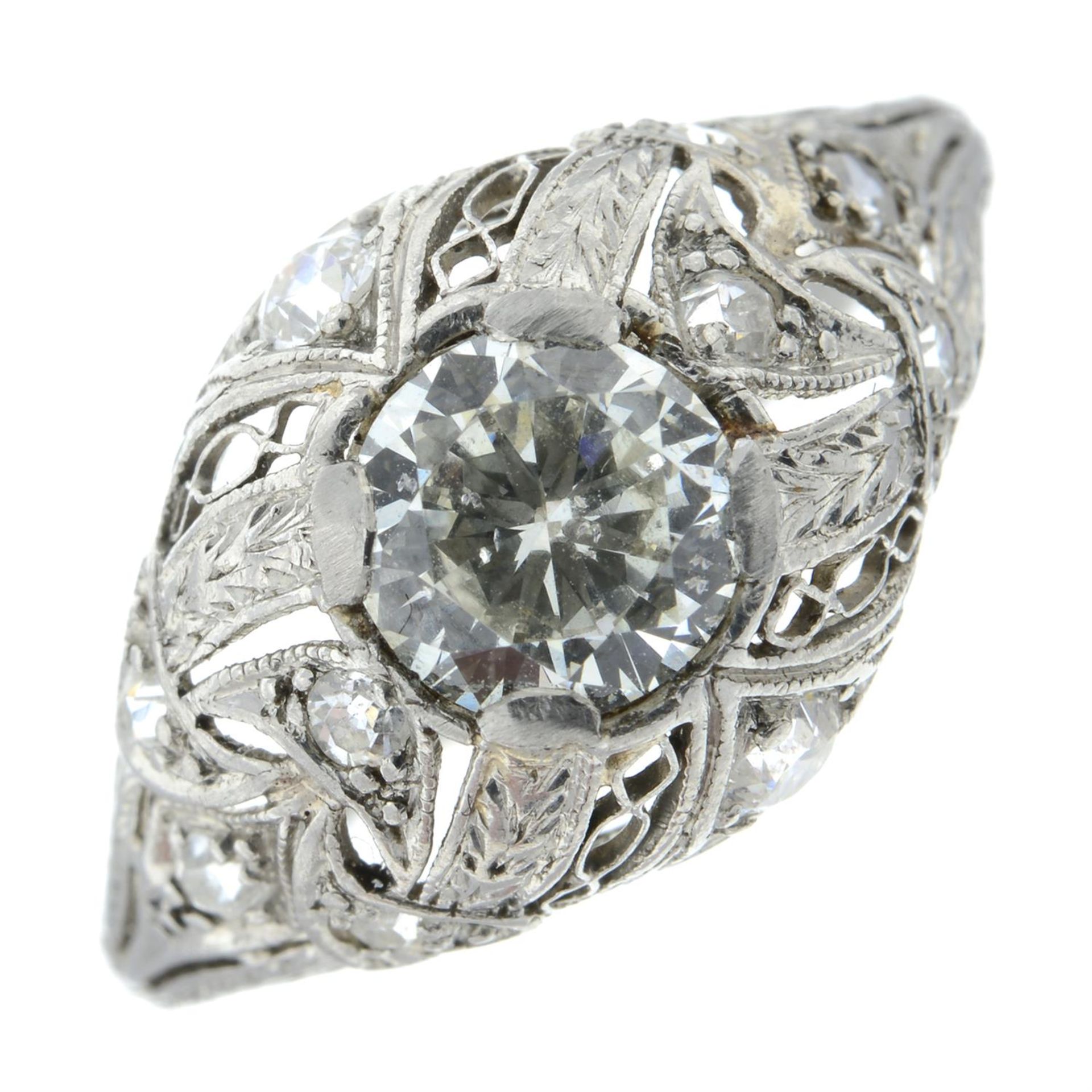 A brilliant-cut diamond openwork ring, with diamond accents.