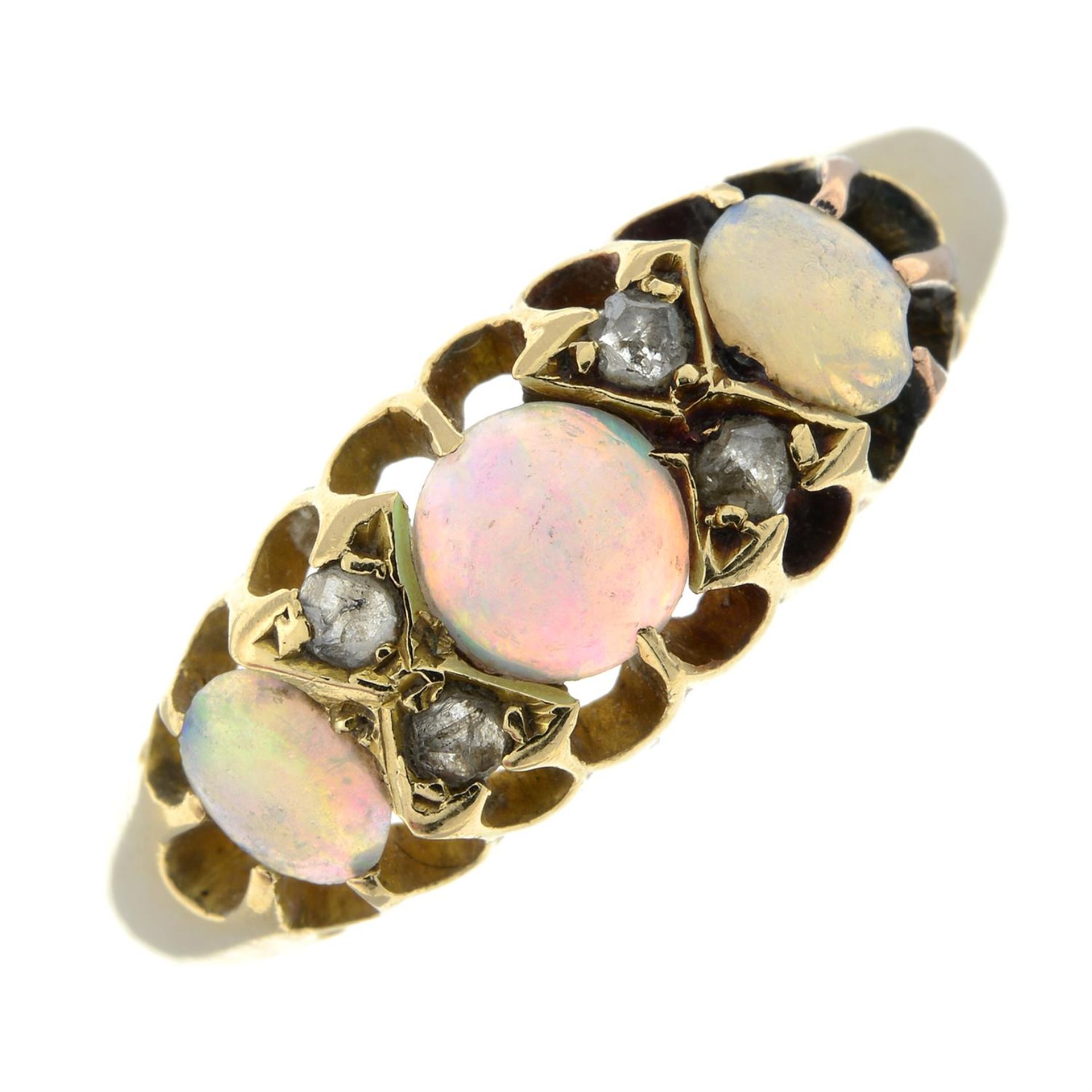 An early 20th century 18ct gold opal ring, with rose-cut diamond spacers.