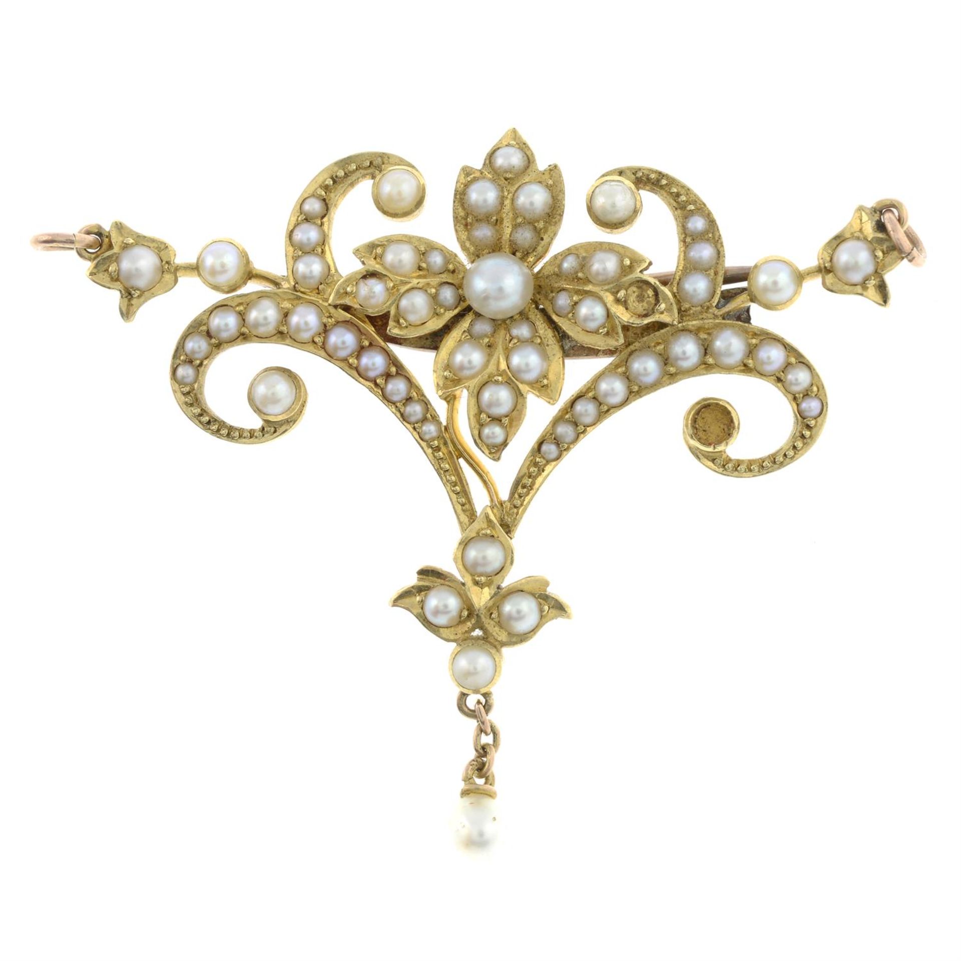 An early 20th century gold split pearl foliate brooch/pendant.