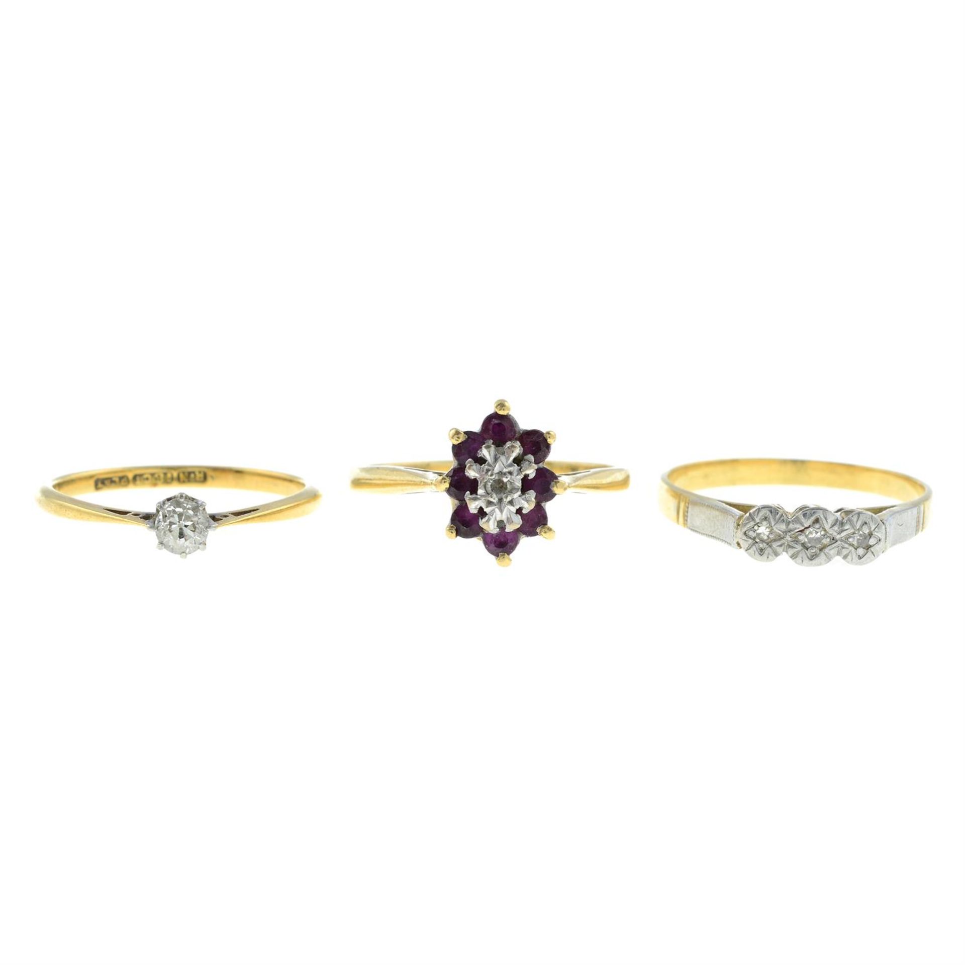 Three gem-set rings.