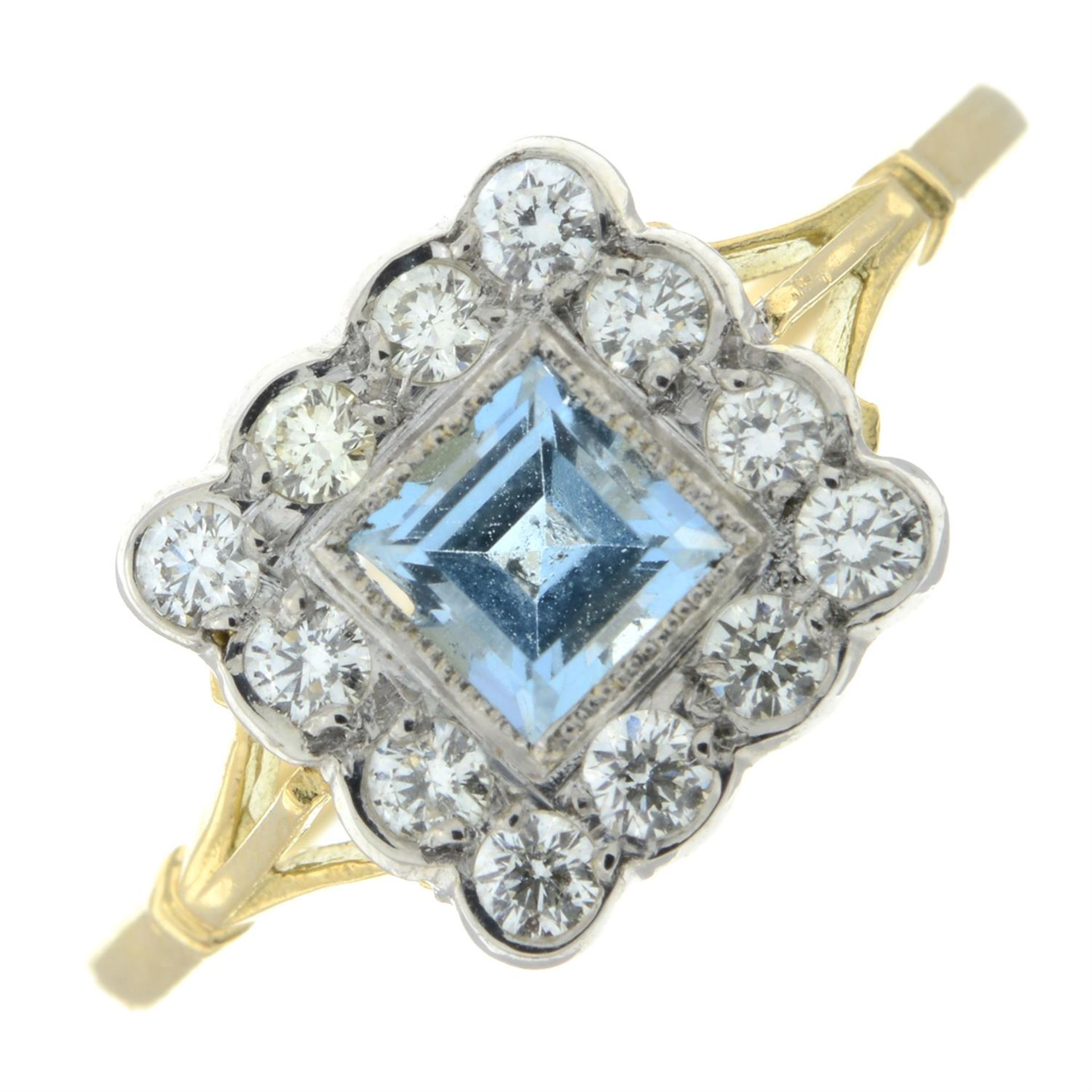 An aquamarine and diamond cluster ring.