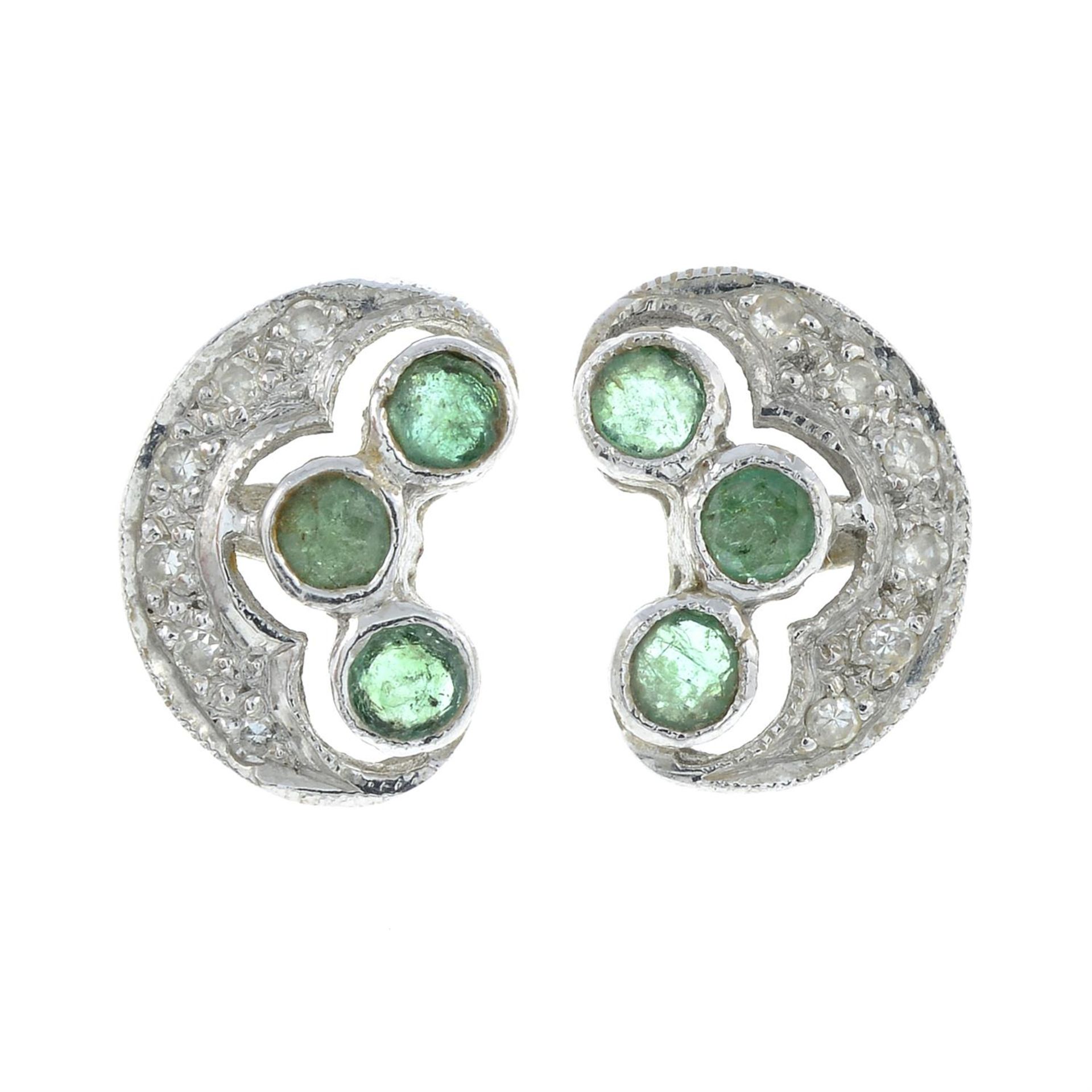 A pair of 9ct gold emerald and single-cut diamond stud earrings.