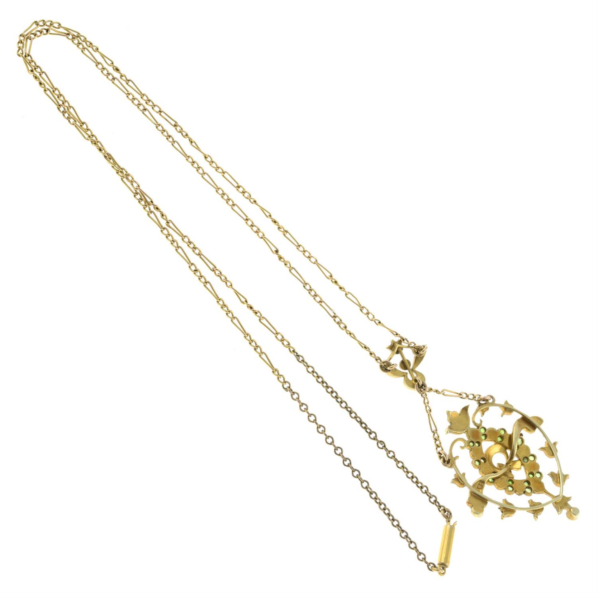 An early 20th century 15ct gold demantoid garnet and split pearl pendant, on an integral chain. - Image 2 of 2