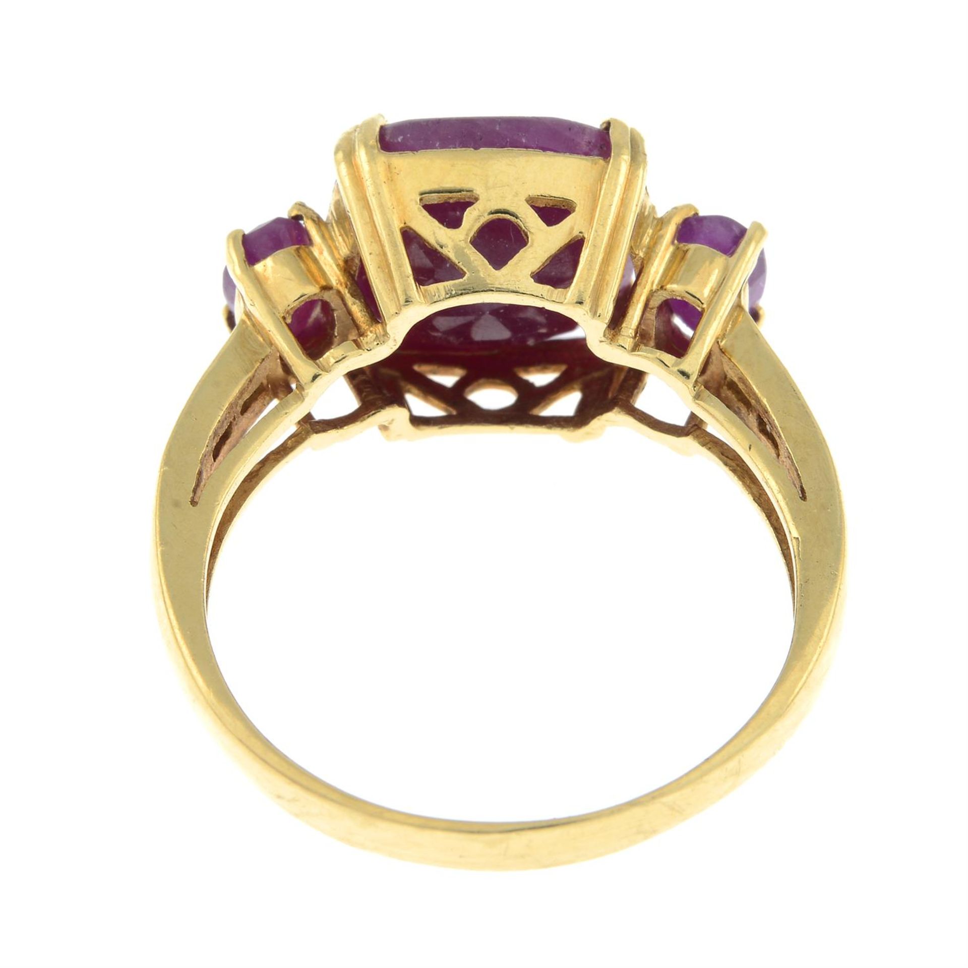 A ruby three-stone ring with diamond shoulders. - Image 2 of 2