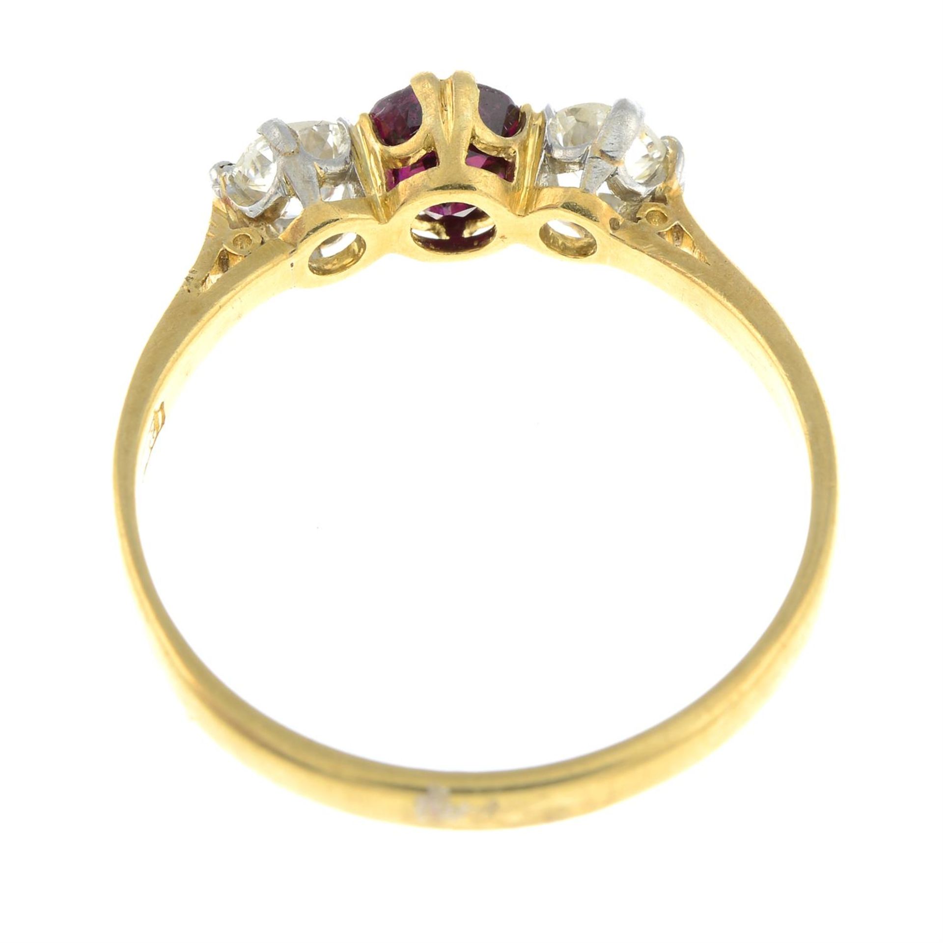An early to mid 20th century 18ct gold ruby and old-cut diamond three-stone ring. - Image 2 of 2