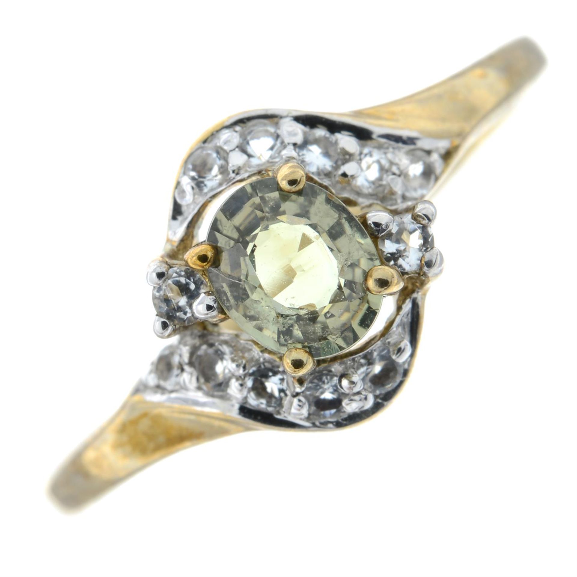 A 9ct gold green sapphire and colourless gem dress ring.