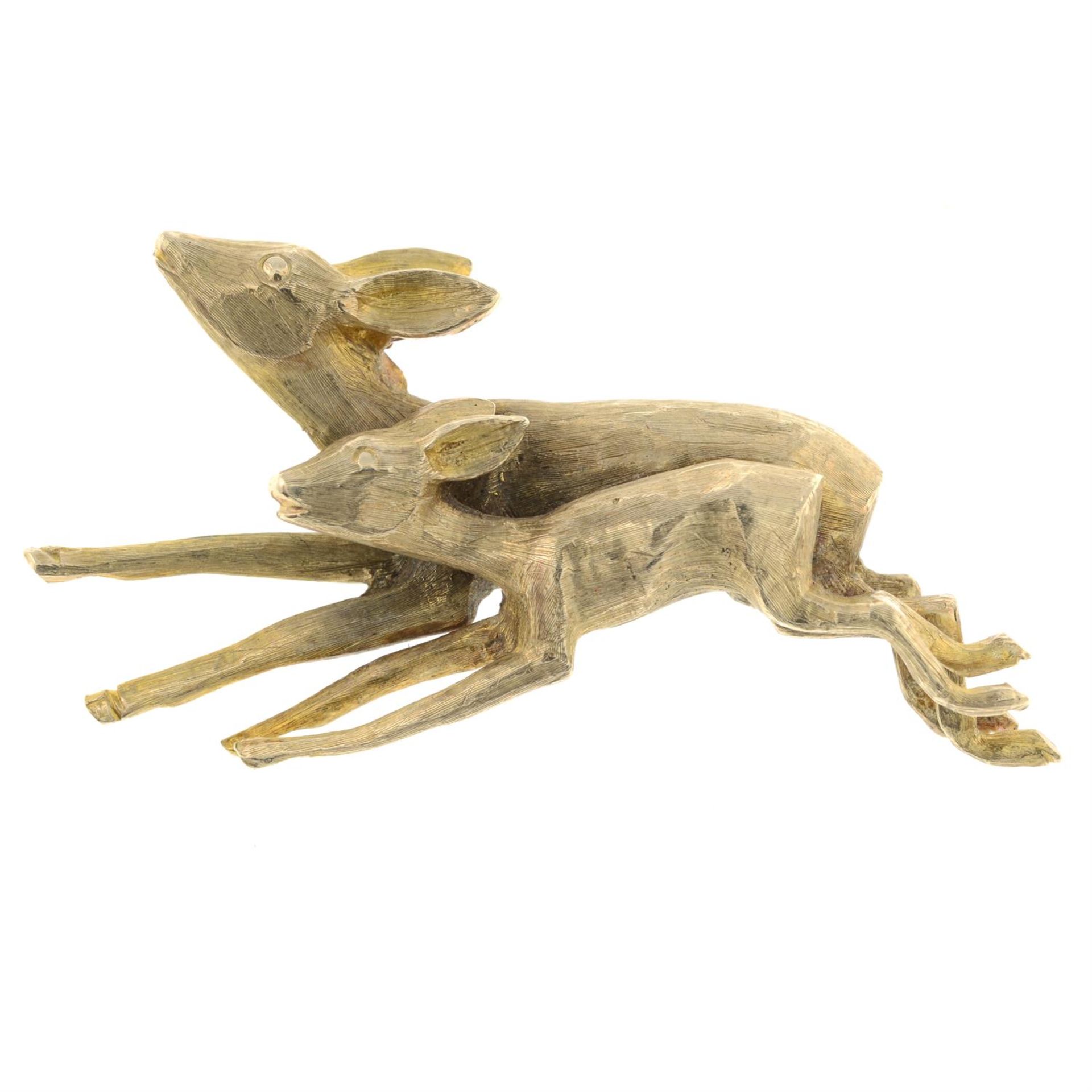 A brooch, designed as a deer and fawn.