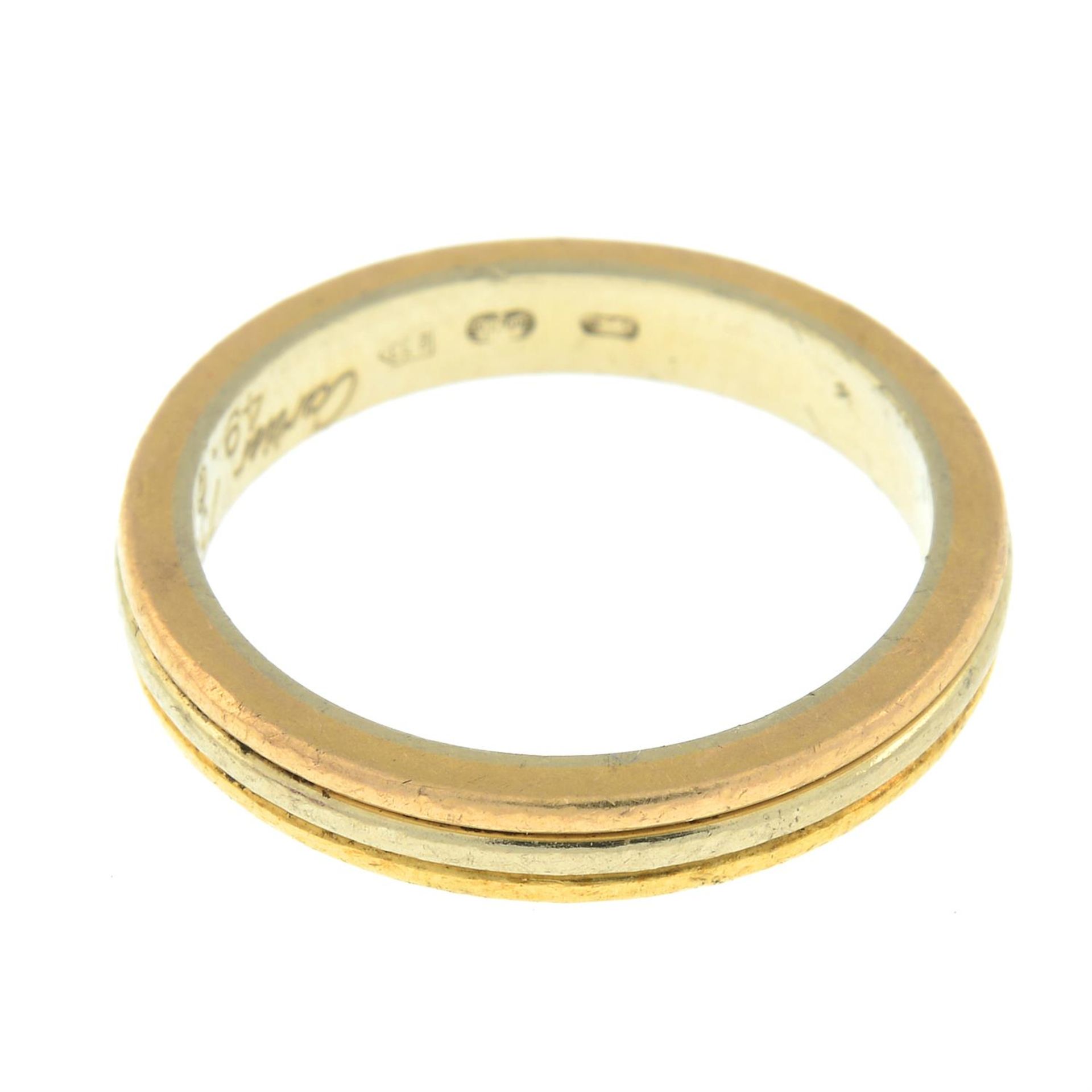 An 18ct gold 'Trinity' band ring, by Cartier. - Image 2 of 2