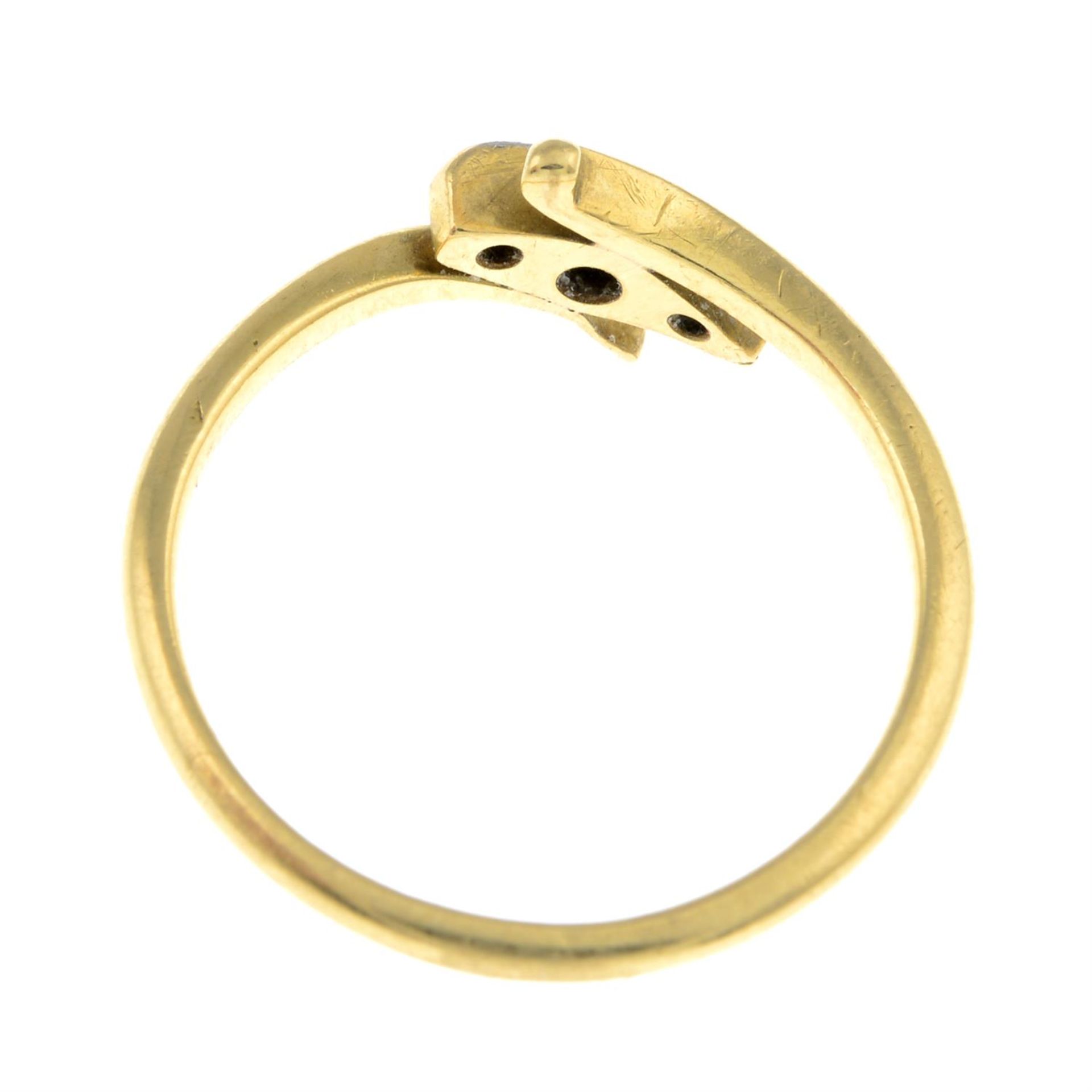 A mid 20th century 18ct gold diamond three-stone crossover ring. - Image 2 of 2